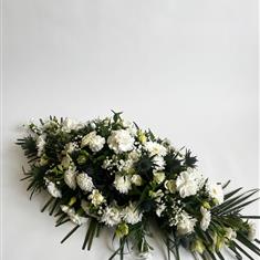 White Casket Spray Including Thistles